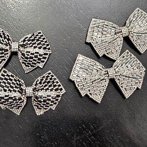 2 sets of Black and clear Rhinestone hair bows.